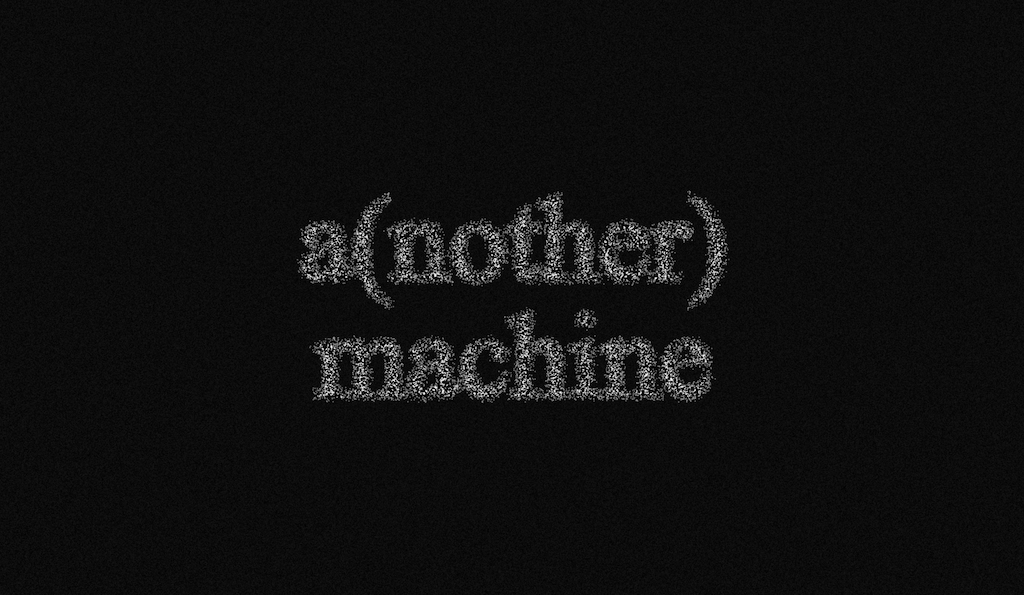 White particles on a black background spelling out 'a(nother) machine'